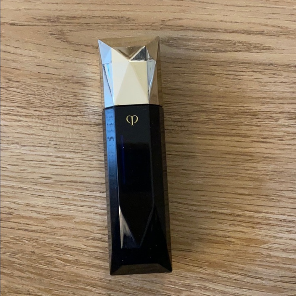 Cle de peau extra rich lipstick in 311 Red Abundan